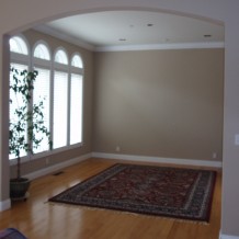 Before Portola Valley Dining Room arched windows wood floor rug